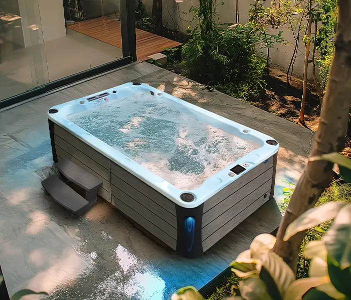 Hot Tubs, Spas, Portable Spas, Swim Spas for Sale Hot Tubs, Spas, Portable Spas, Swim Spas for Sale Calspas hot tub being used in a family setting